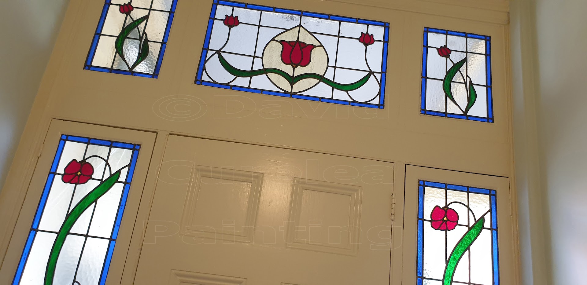 Leadlight panels above a painted interior door