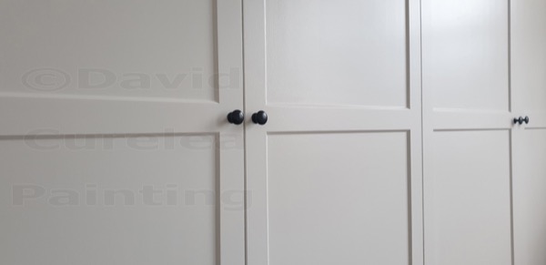 Painted built-in cupboard doors