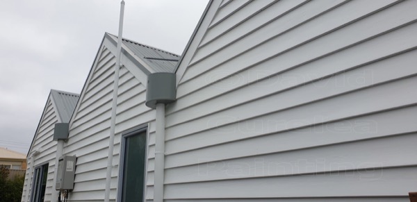 Painted weatherboard cladding on a house exterior